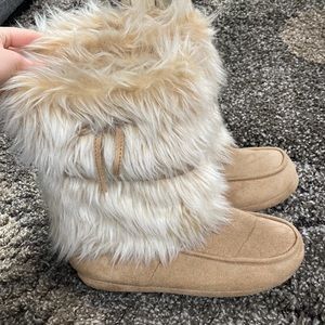 Furry slipper boots.